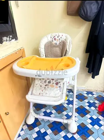 Used adjustable baby high chair with removable tray - good condition