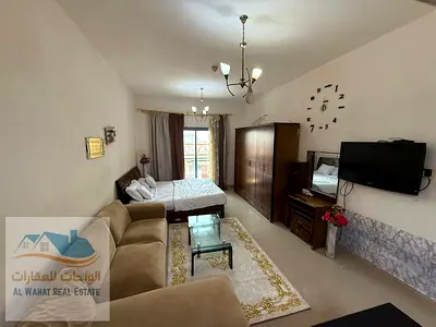 Furnished studio apartment with balcony for monthly rent in Al Nuaimiya 1, next to Al Hikma School in Al Nuaimiya Towers. Price includes all bills and
