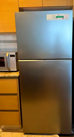 Good condition top-freezer refrigerator - stainless steel finish