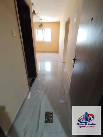 2-bedroom apartment in Al Qasimia Al Nad, second tenant in a brand-new modern tower. Super Lux finishing, central AC, 2 bathrooms and parking included