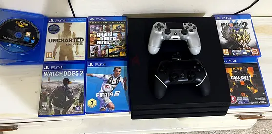 Sony PS4 Pro console with 2 controllers and 7 CD and 3games installed spiderman asphalt stumble guy