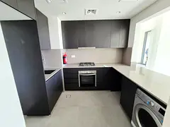 Semi close kitchen 2bedroom corner unit only 86k in aljada with all Facilities gym pool and BBQ area