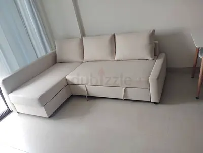 Light beige L-shaped fabric sofa with chaise - good condition