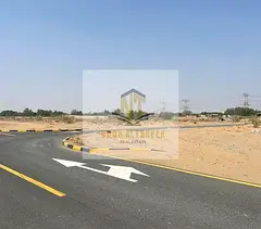 A prime commercial plot directly on Maleha Road in Al Bleida 2, available for freehold ownership by 