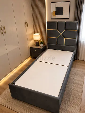 Single upholstered bed frame with padded headboard