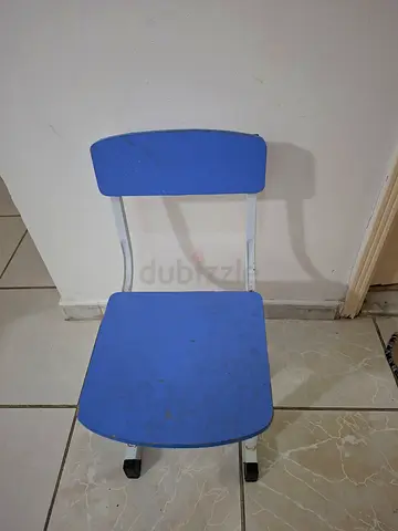 Simple blue metal-framed chair with backrest
