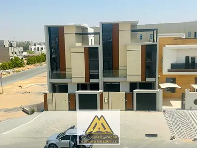 5-bedroom villa with central air conditioning, first occupancy, prime location in Al Helio, close to all services and near Sharjah and Dubai.