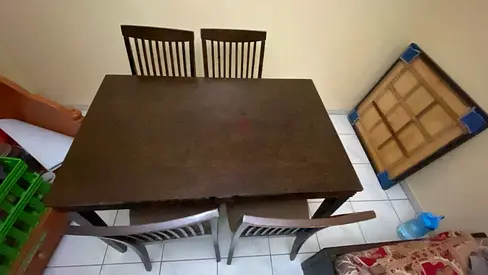 Solid wood 4-seater dining table with chairs - used