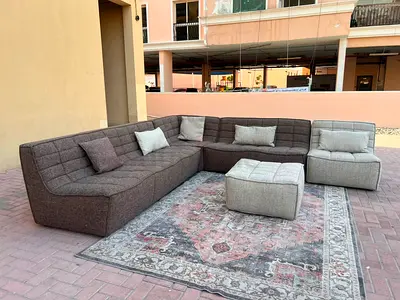 Brand New condition Al Huzaifa Corner sofa and with stool