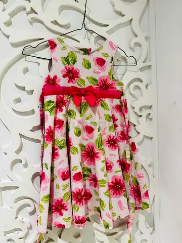 Girls floral party dress with pink ribbon - size small