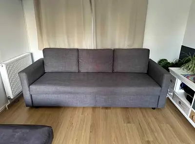 Grey fabric sofa bed - converts to double bed, good condition