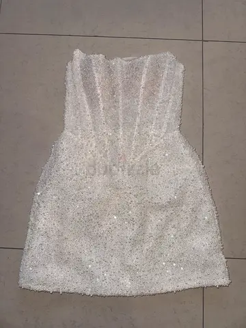 White sequined and beaded strapless bridal/cocktail dress from Rosie Etienne