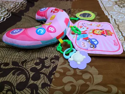 Baby tummy time with toys