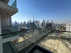 High-Floor 3BR Apartment | Burj Khalifa & Canal View | Furnished