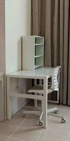White corner study desk with shelving and rolling chair - great condition