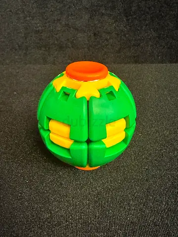 Small Green Transforming Puzzle Ball Toy - Fidget/Skill Toy ( wholsales only )