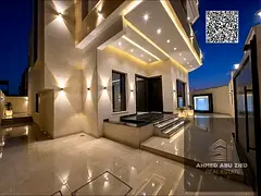 Luxury spacious villa in Al Helio, Ajman, corner plot, 2 floors + roof, 5 bedrooms, 6 baths, majlis,