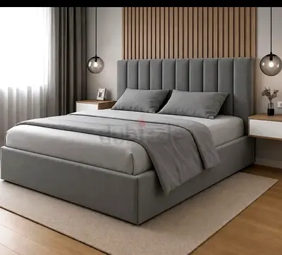 Grey upholstered queen size bed with mattress