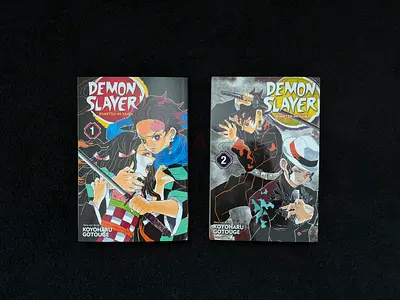 WTS | Demon Slayer manga volumes 1 & 2 (English)