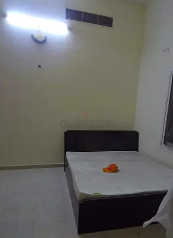 Used wooden bed frame with mattress