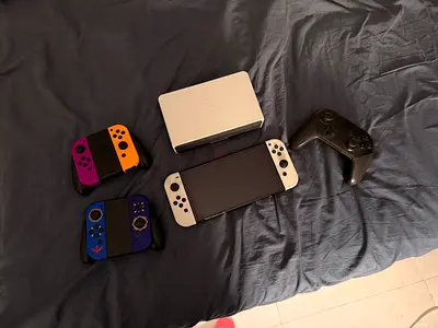 Nintendo Switch OLED + Pro Controller and Extra Joy-Con