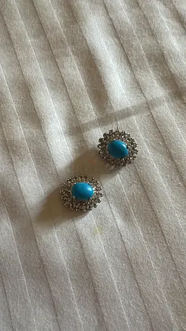 Pair of turquoise stone stud earrings with crystal halo
