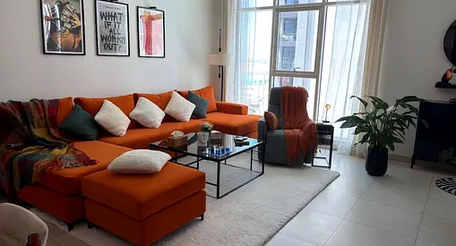 Large Orange L-shaped Sofa with Ottoman — Good Condition