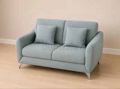 Light grey 2-seater sofa in good condition