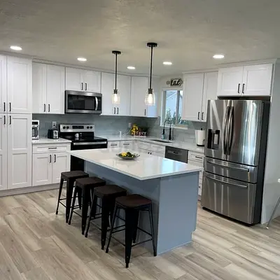 Modern White Kitchen with Island and storage cabinet  and marble top