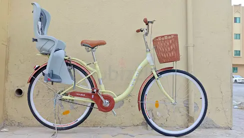 Cruiser bike +baby seat free delivery high quality brand new assembled with basket and soft seat