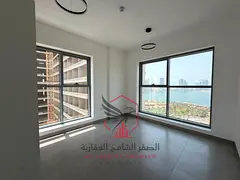 Central AC & gas, family tower, new finish. Annual rent in Al Majaz 2: 2BR, 2 baths, open sea view, 