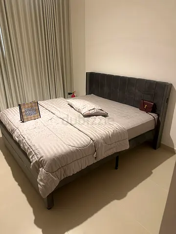 Grey upholstered king bed with headboard with mattress - Good condition