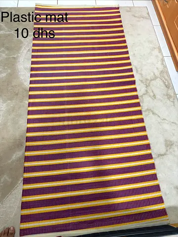 Striped plastic floor mat - good condition