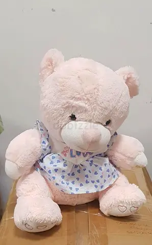 Soft pink teddy bear with dress - good condition