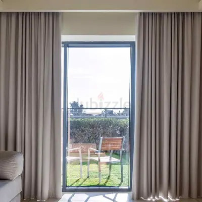 Light beige blackout curtains - pair, ready to hang Par meter 55 dh only Each