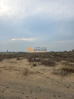 A prime plot of land in the Al-Sahma area, combining commercial and residential properties.