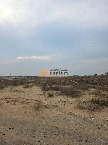 A prime plot of land in the Al-Sahma area, combining commercial and residential properties.