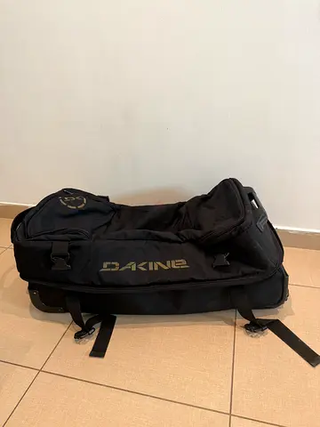Large Dakine Split Roller suitcase in black