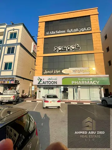 Residential Commercial Building for Sale in Al Alia, Ajman, generating AED 280,000 annual income, strategically located on a main road. Asking price A