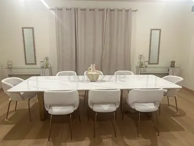 Marble-look 8-Seater Dining Table with Chairs with 2 side table and 2 mirrors with the decoration