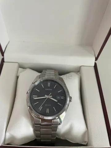 Casio stainless steel men's watch with date - good condition