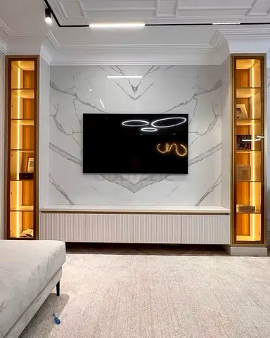 Built-in Entertainment Wall Unit with Marble Backdrop and Display Shelves