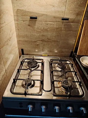 Used 4-Burner Stainless Steel Gas Stove