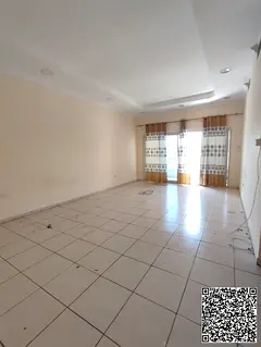 For annual rent in Al Bustan, Ajman, a spacious two-bedroom apartment with a living room is availabl