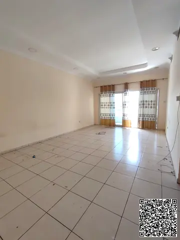 For annual rent in Al Bustan, Ajman, a spacious two-bedroom apartment with a living room is available in a prime and convenient location. The apartmen