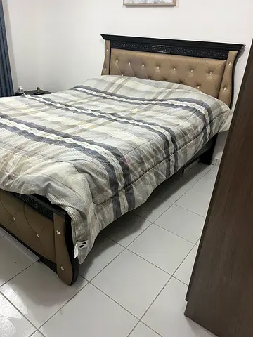 Queen size upholstered bed frame with tufted headboard - good condition