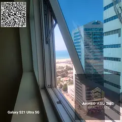 2BR hall in Ajman One Towers Rashidiya 3 with two balconies, great view, three bathrooms, store room