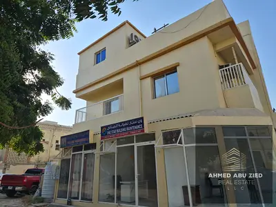 بناية سكنية تجارية للبيع في الليورة عجمان، زاوية على شارعين، أرضي وأول، 4 محلات و4 شقق، موقع استراتيجي بالقرب من كورنيش عجمان والواجهة البحرية