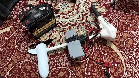 Water snake kayak trolling motor with a battery