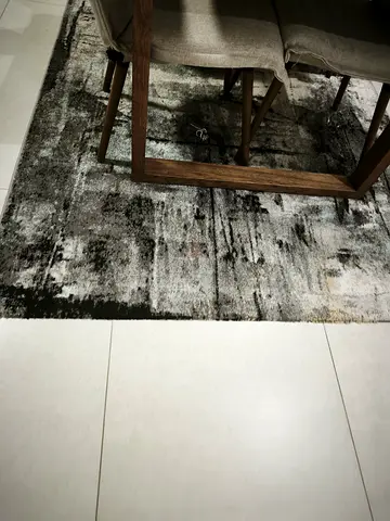 Grey abstract area rug in good condition 155 x 225